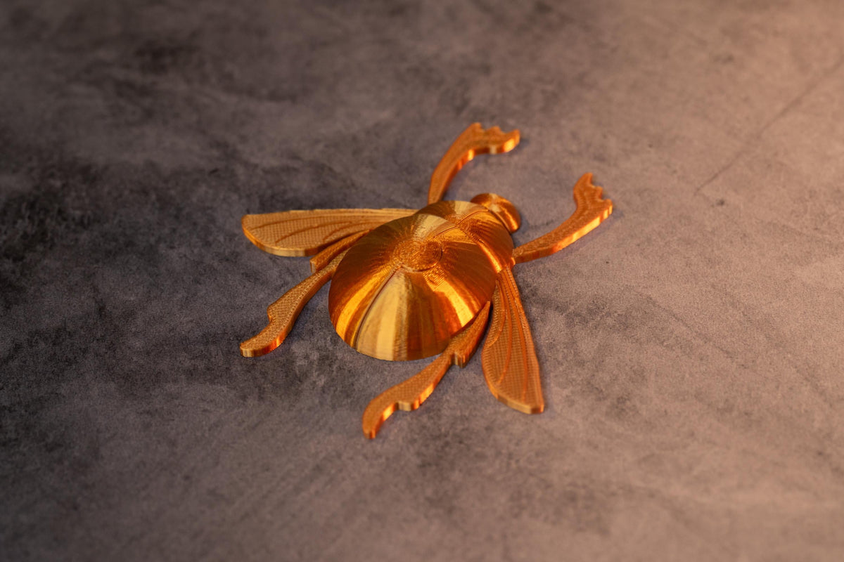 Cave of Wonders Golden Scarab Golden scarab beetle charm for Aladdin enthusiasts Egyptian-inspired Aladdin Golden Scarab Charm Fidget
