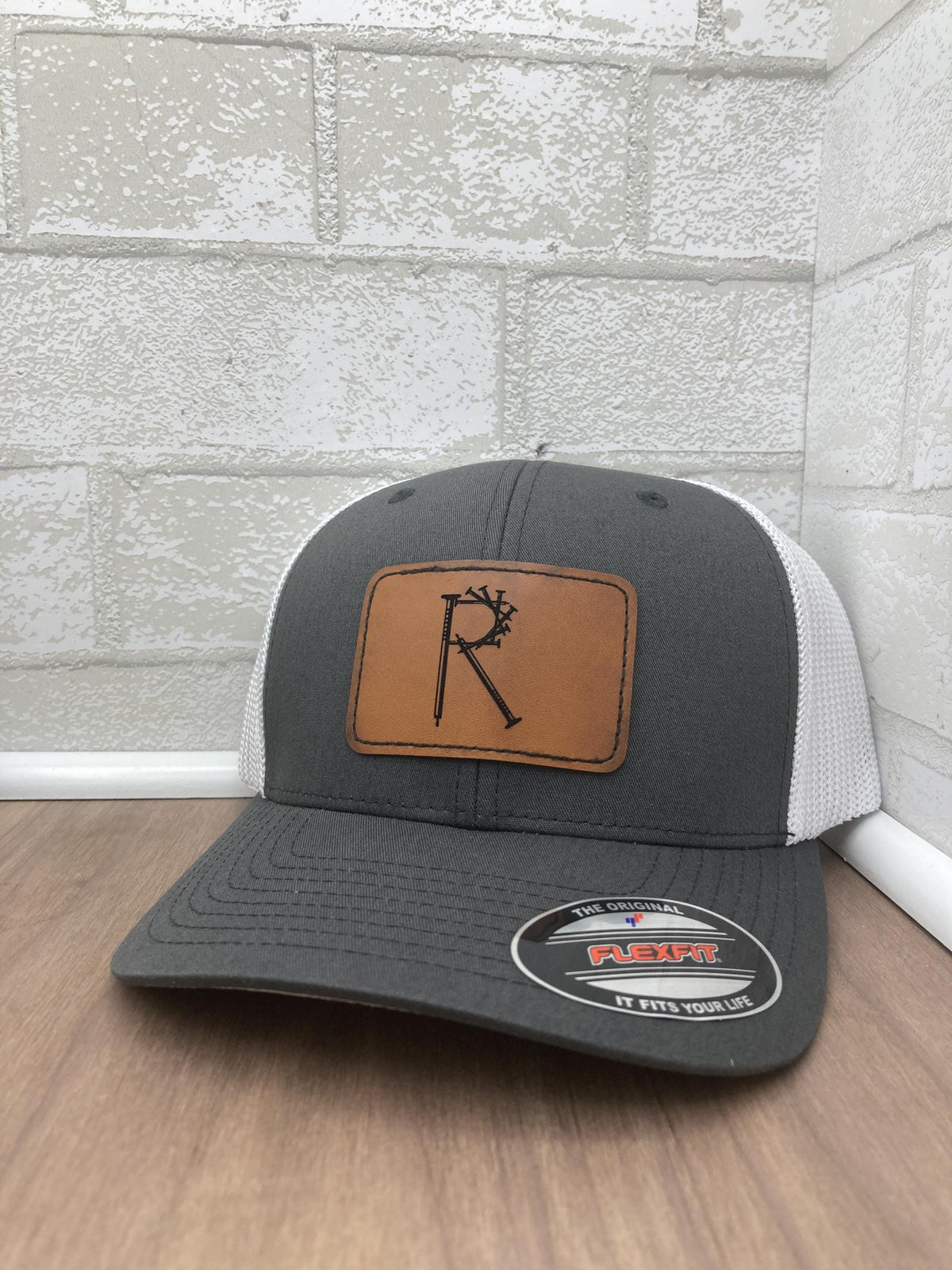 Custom Flexfit 110 Trucker Hat with Faux Leather Logo Patch