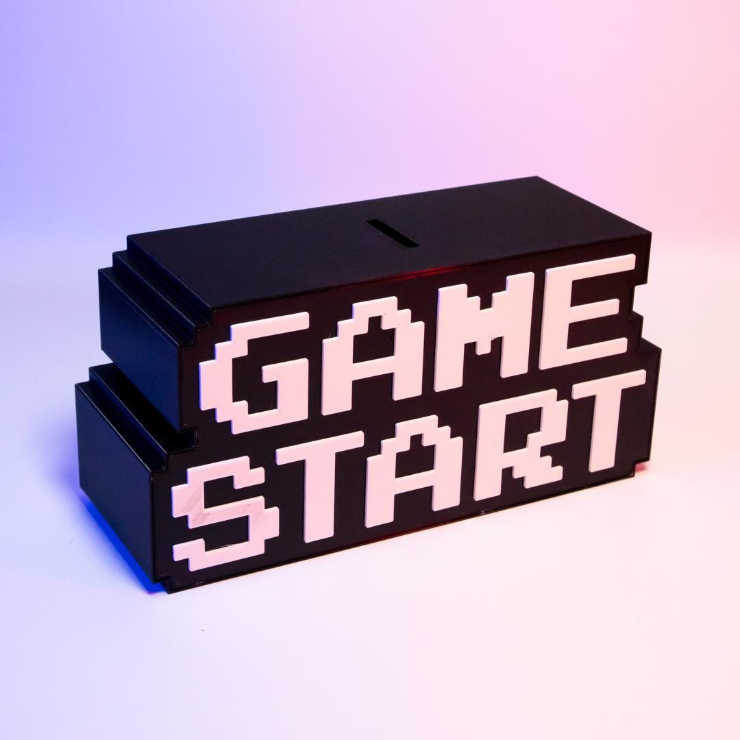 Game Start Piggy Bank Retro Gaming-Themed Savings Bank Fun Desk Decor Perfect Gift for Gamers Unique Arcade Style Coin Bank