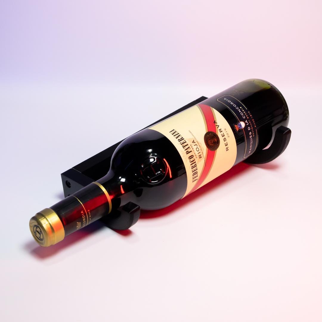 Wine Bottle Wall Mount Elegant Wine Rack Space-Saving Wall Decor Modern Home Accessory Perfect for Kitchens or Dining Rooms Unique Gift Idea